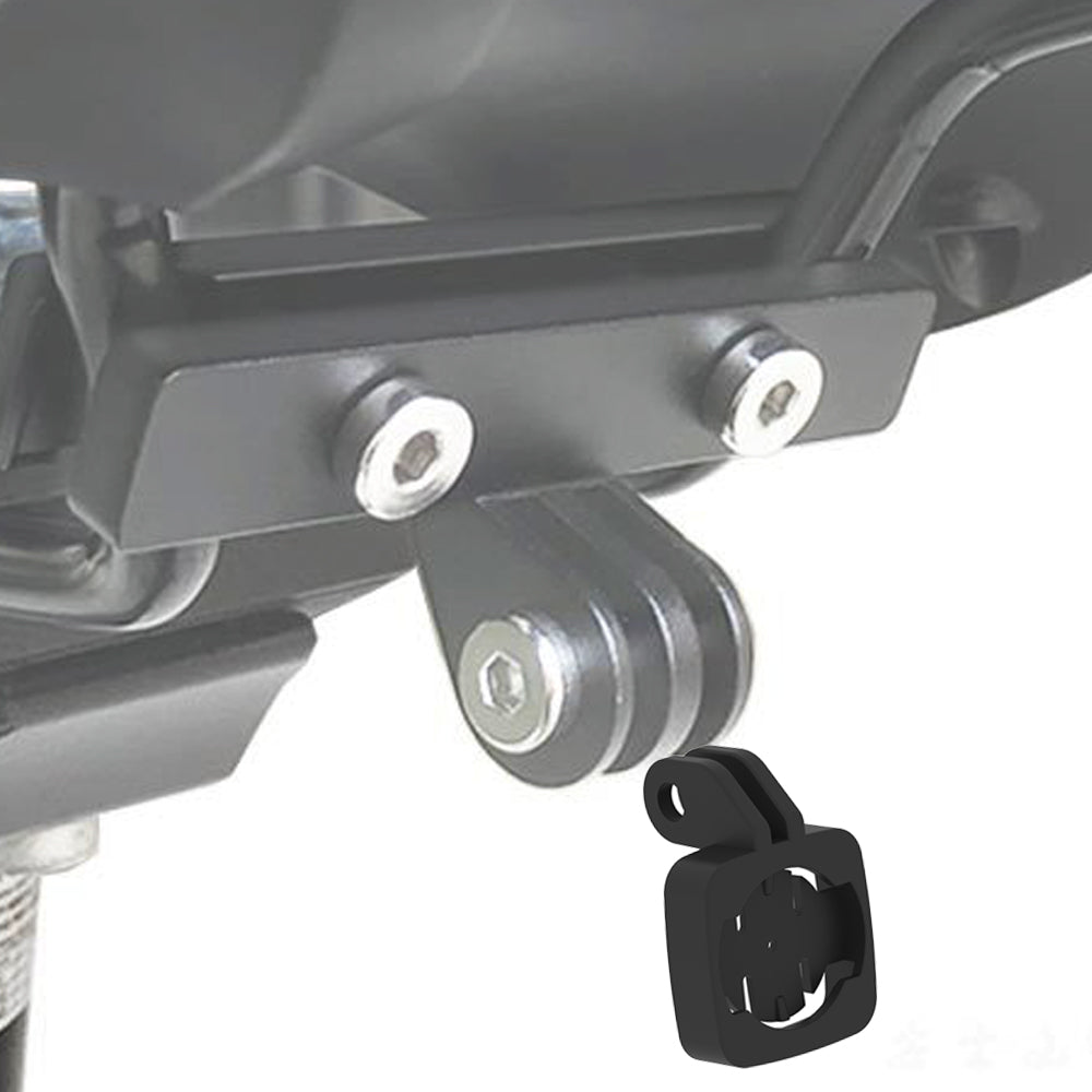 Close-up of a motorcycle exhaust system with mounting hardware on a white background