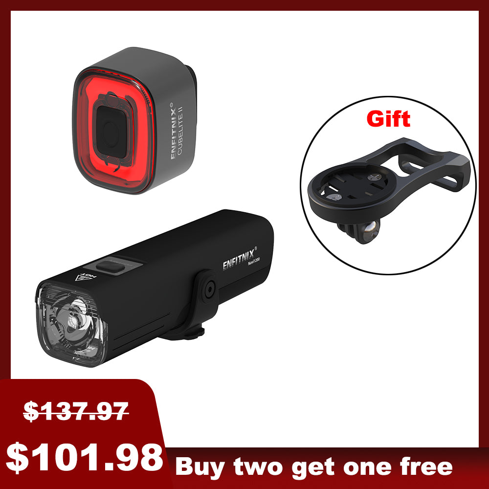 The image shows a black Navi1200 smart front light and CubeliteII tail light for bicycles. The product is displayed with an emphasis on the front light, which has a powerful output of 1,200 lumens, and is designed for off-road and high-speed cyclists.