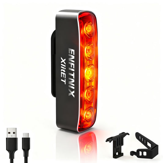 Bicycle tail light with USB cable and mounting brackets on a white background