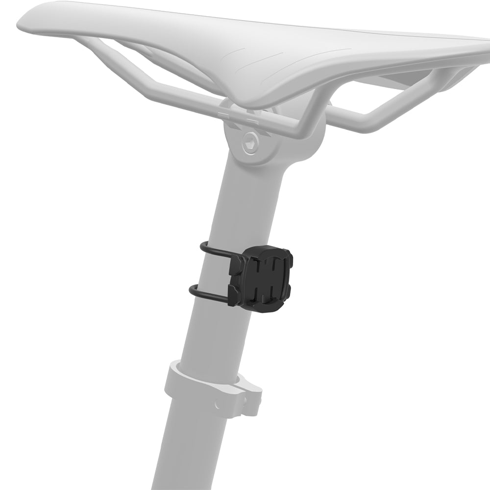 White bicycle seat with black clip on a white background