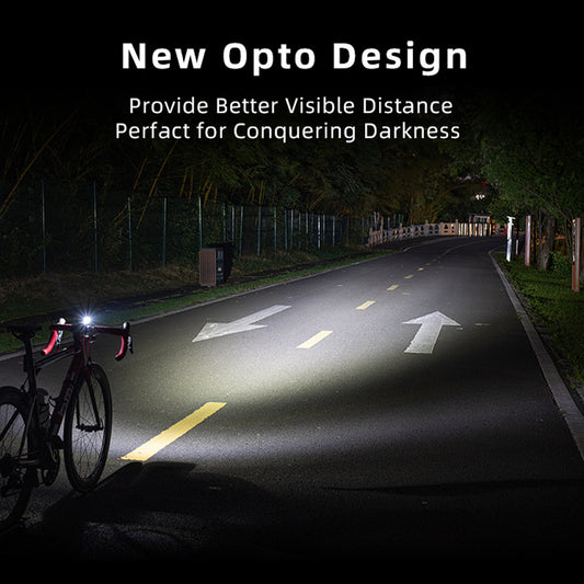 Bicycle with a headlight on a dark road at night, highlighting the 'New Opto Design' feature.