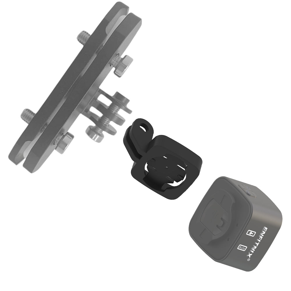 Mechanical components including a metal bracket, black clip, and gray control unit on a white background.