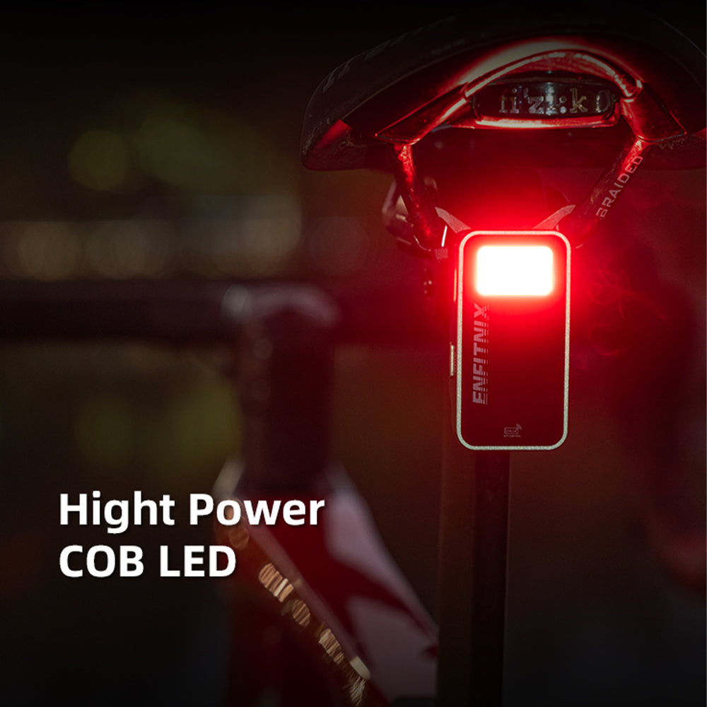 Red bicycle light with 'High Power COB LED' text on a dark background