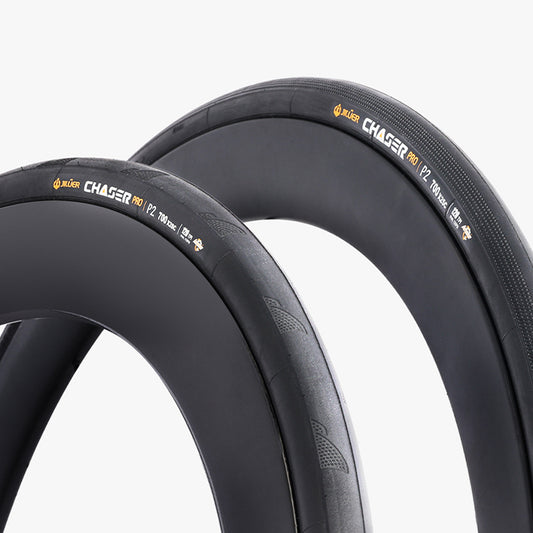 Two black bicycle tires with 'Chaser' branding on a white background