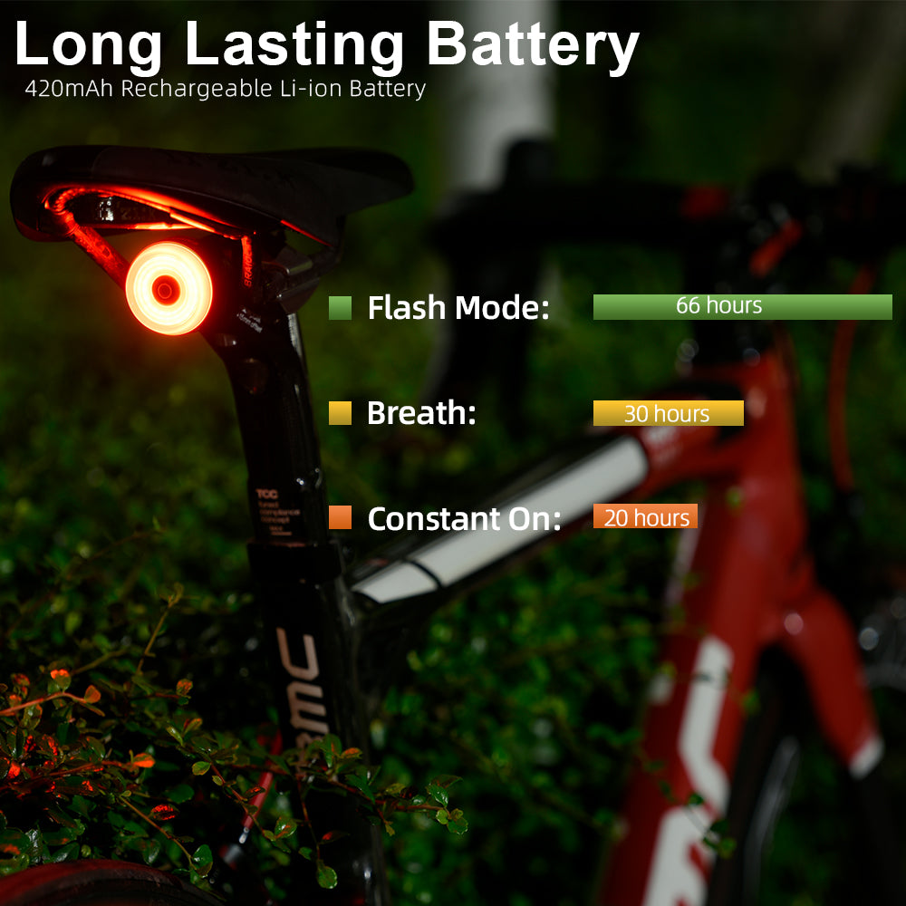 Bicycle tail light with battery information on a blurred natural background