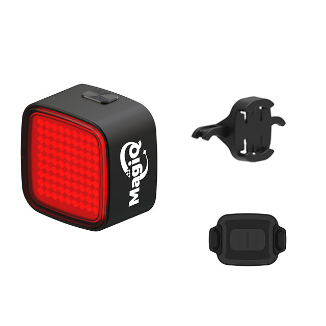 Red bike light with mounting accessories on a white background