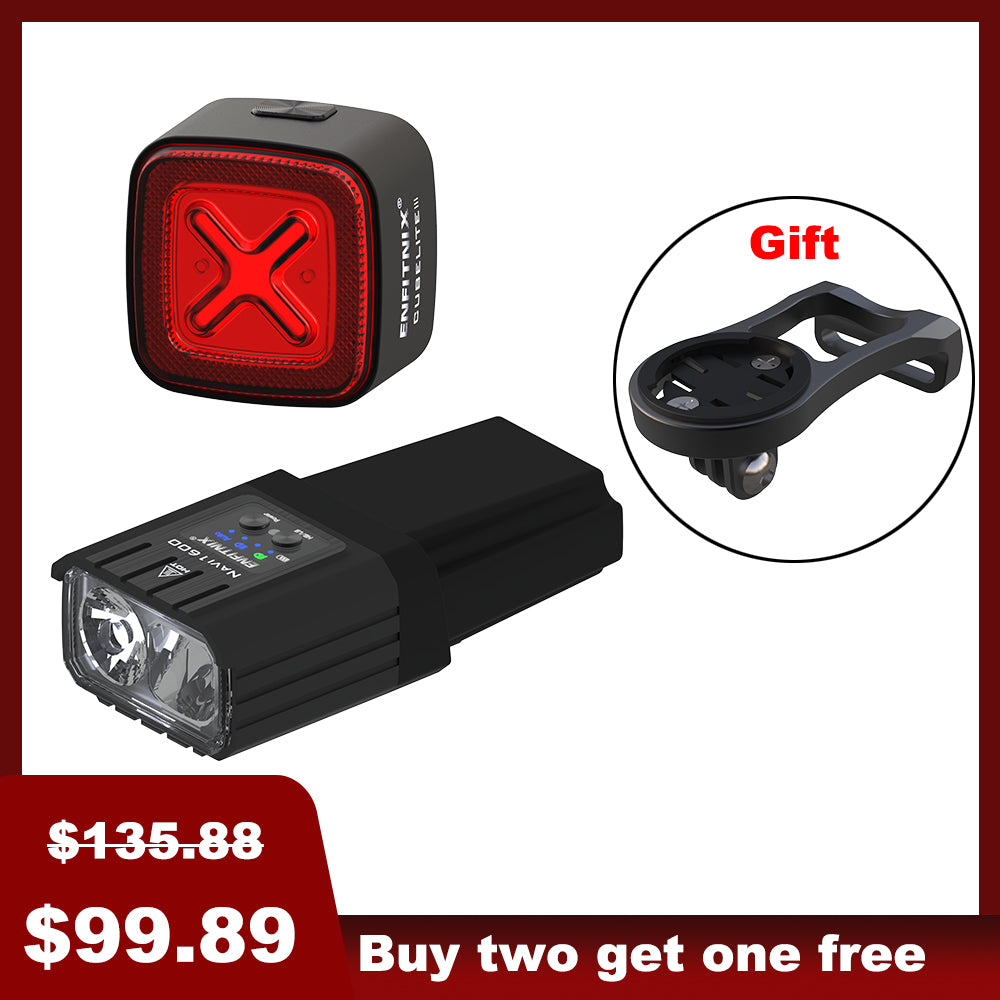 The image shows a set of bike lights with the front light prominently displayed alongside a red tail light in the background. The front light has a black rectangular housing with a white light module, and there's a 'Gift' badge indicated in the top right corner.