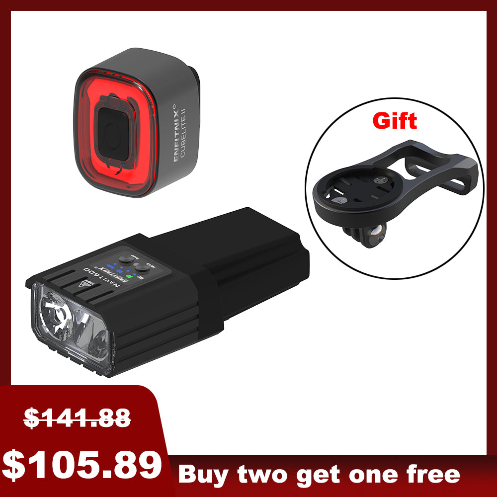 The image shows a set of bike lights with the front light prominently displayed alongside a red tail light in the background. The front light has a black rectangular housing with a white light module, and there's a 'Gift' badge indicated in the top right corner.
