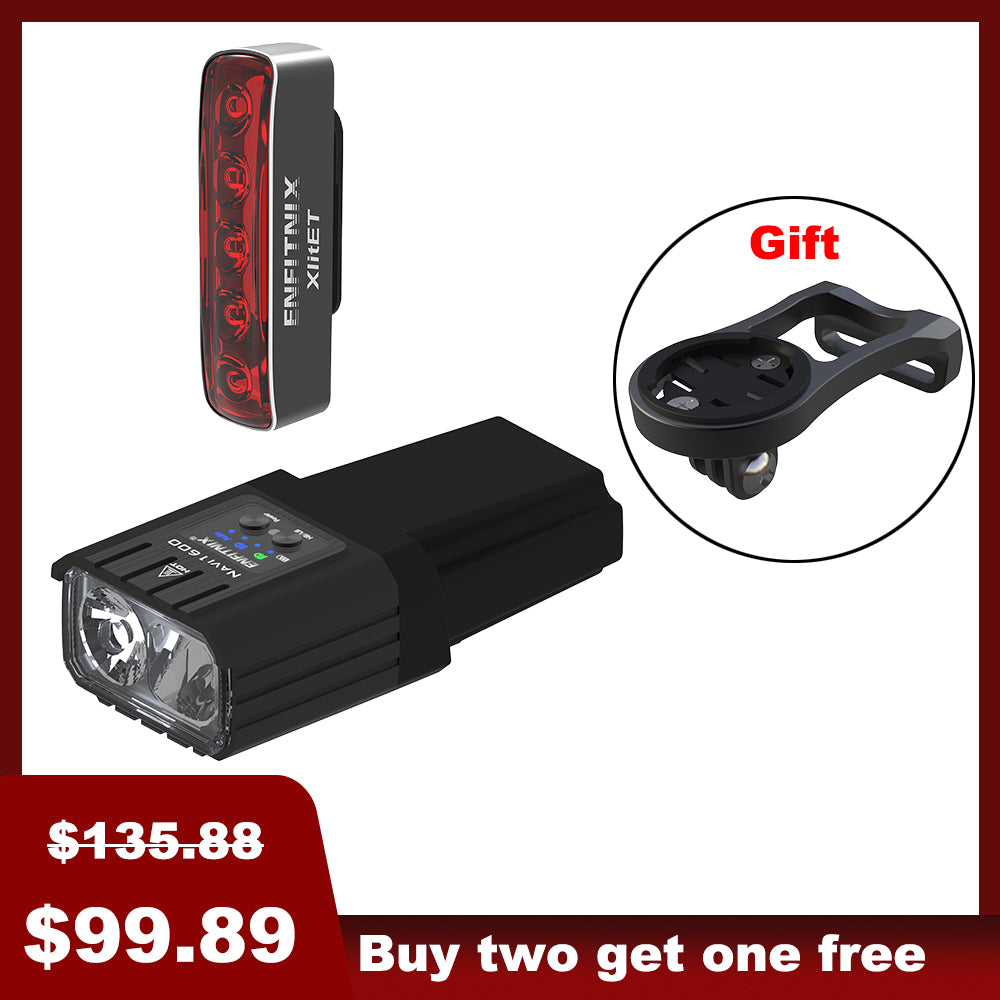 The image shows a set of bike lights with the front light prominently displayed alongside a red tail light in the background. The front light has a black rectangular housing with a white light module, and there's a 'Gift' badge indicated in the top right corner.