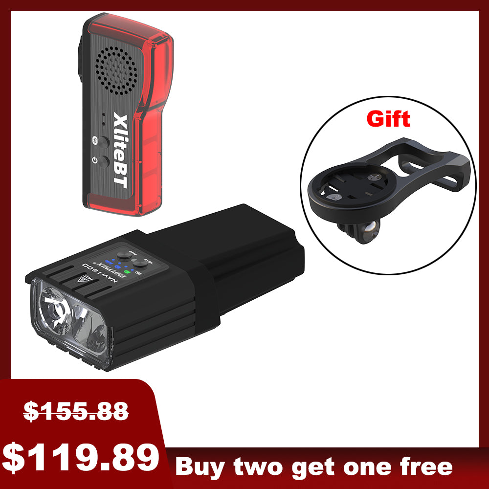 The image shows a set of bike lights with the front light prominently displayed alongside a red tail light in the background. The front light has a black rectangular housing with a white light module, and there's a 'Gift' badge indicated in the top right corner.