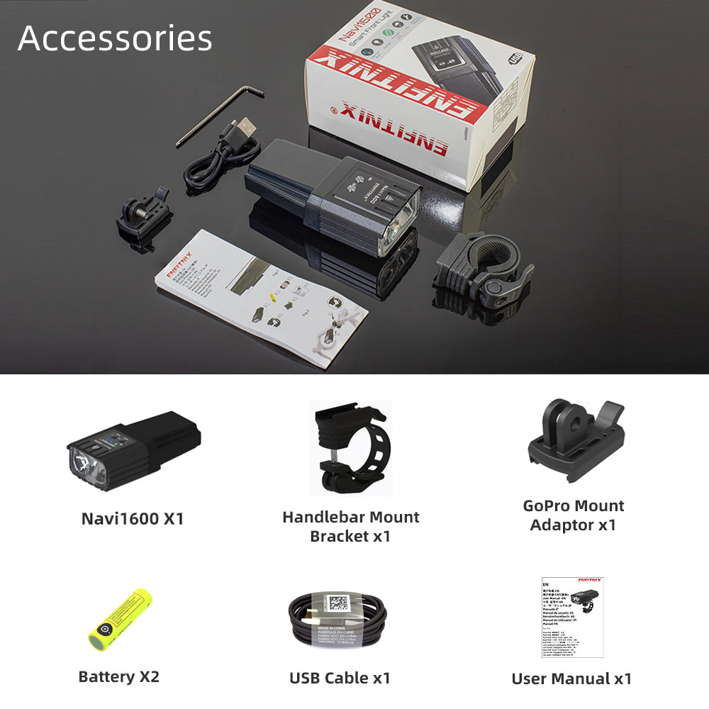 Collection of ENGINIX accessories including Navi1600 X1, Handlebar Mount Bracket, GoPro Mount Adapter, Battery, USB Cable, and User Manual on a reflective surface.