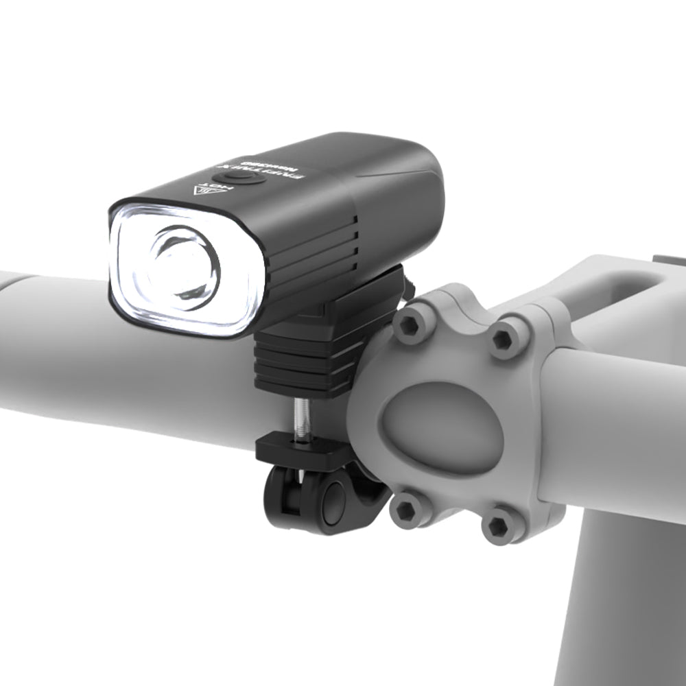 Bicycle light attached to a bike handlebar on a white background