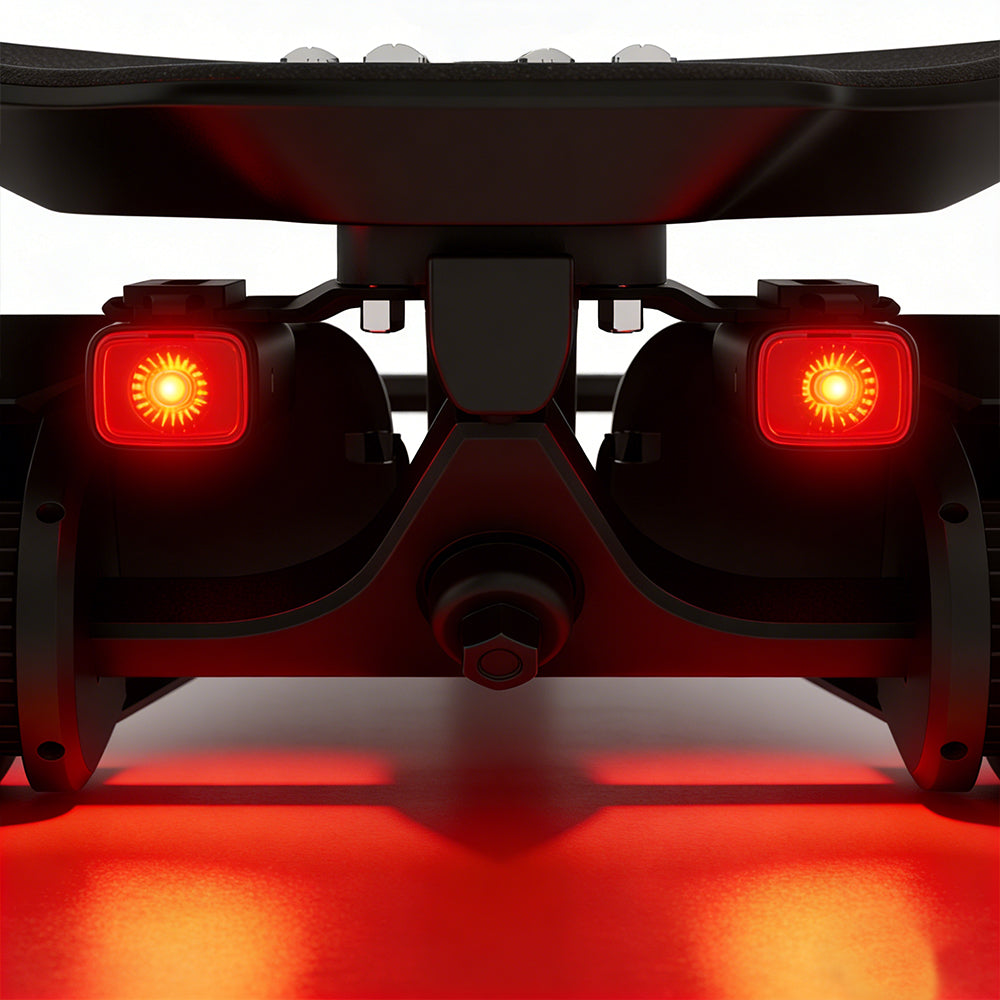 Close-up of a vehicle's red brake lights on a white background