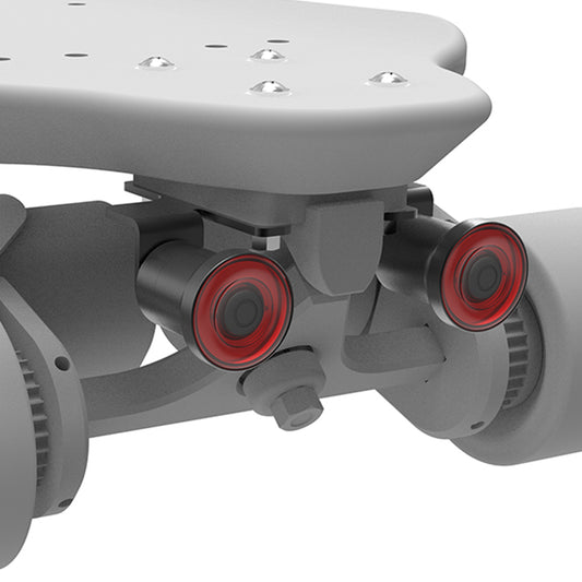 Close-up of a scooter with red wheels on a white background