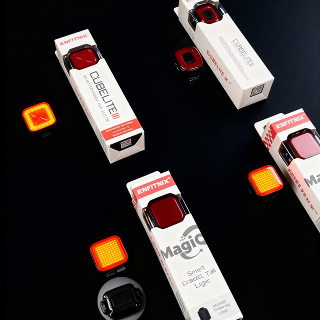 Exfitnix CubeLite II and MagicQ smart light tag packaging on a black background