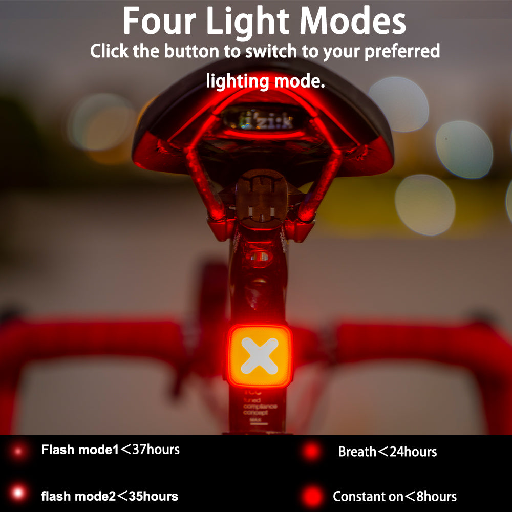 Bicycle tail light with four light modes displayed on a blurred background