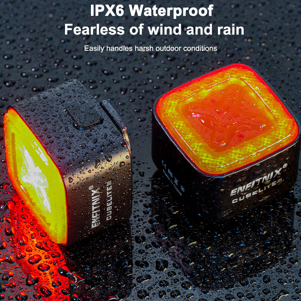 Two waterproof cube lights on a wet surface with text highlighting their IPX6 rating.