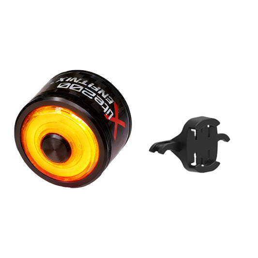 Orange bike light with black mounting bracket on a white background