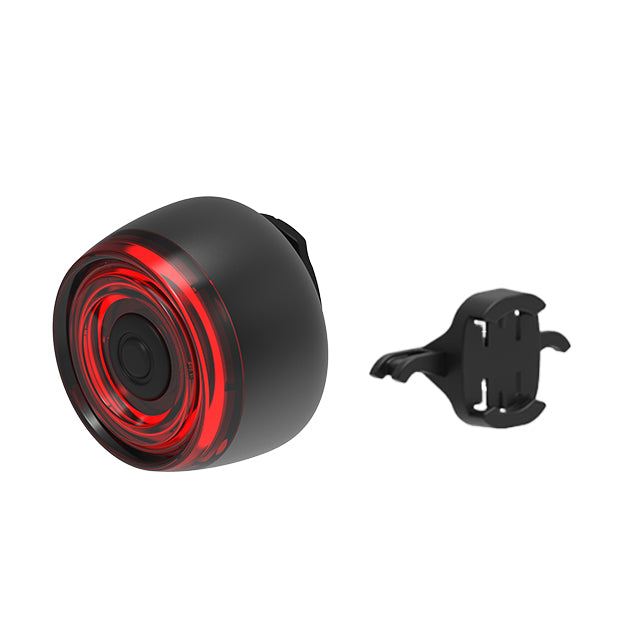Black and red bike light with a mounting bracket on a white background