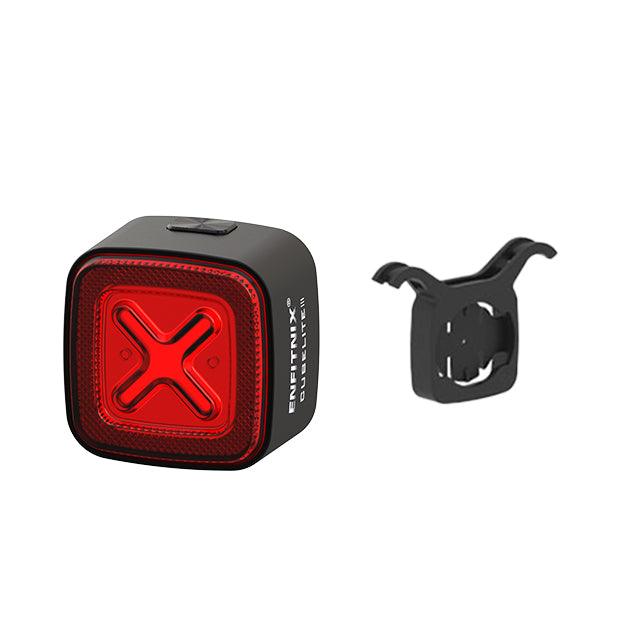 Red bike tail light with black mounting bracket on a white background
