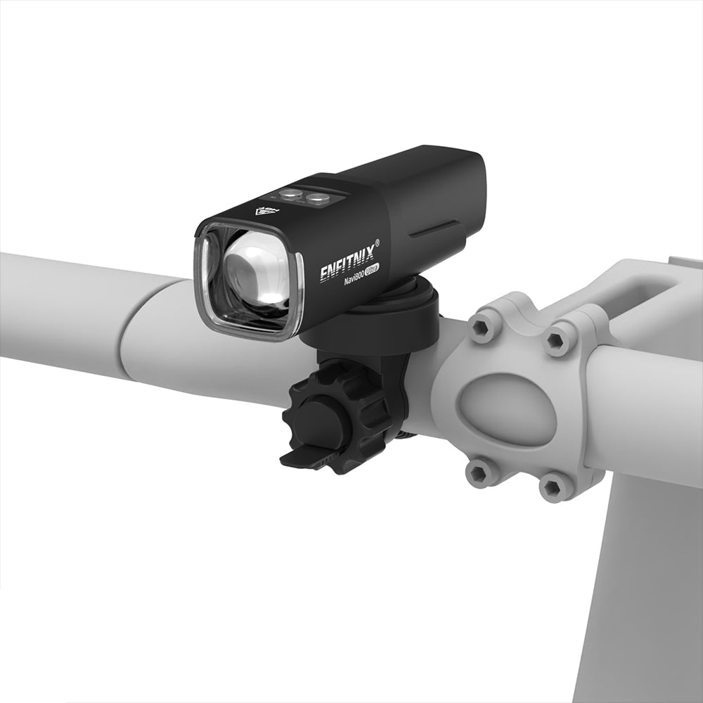 Bicycle light attached to a bike handlebar with a white background