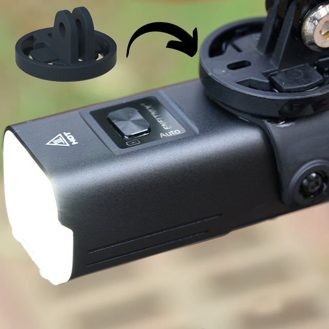 Camera flash unit with a lens cap attachment on a blurred background