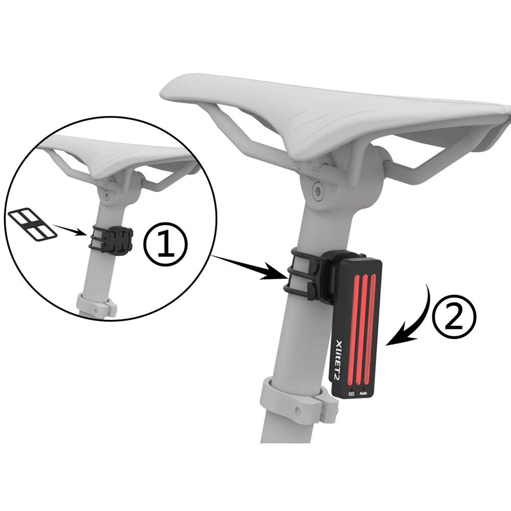 Bicycle seat with a light attachment on a white background
