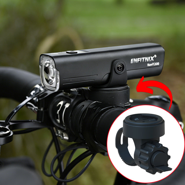 Bicycle light with ENFITNIX branding on a blurred green background