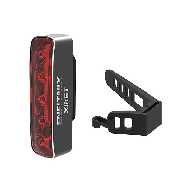 Black and red bike light with clip on a white background