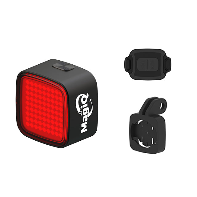 Red bike tail light with mounting accessories on a white background