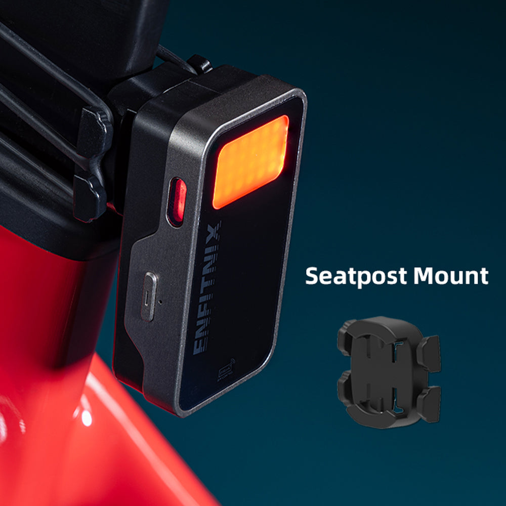 Bicycle light with seatpost mount attachment on a dark background