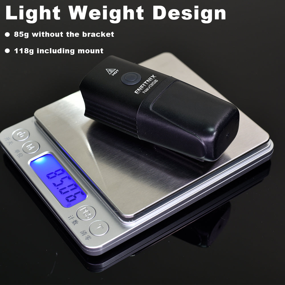 Black device on a digital scale with weight display, against a black background.