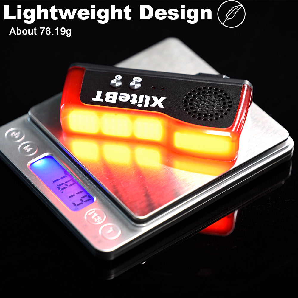 XliteBT bike light on a digital scale with 'Lightweight Design' text above.