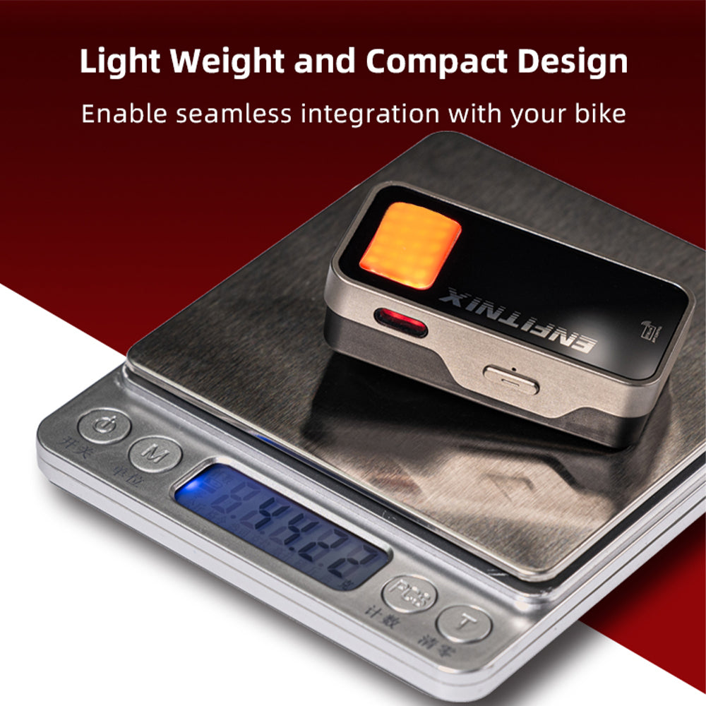 Small electronic device on a digital scale with text about weight and bike integration.