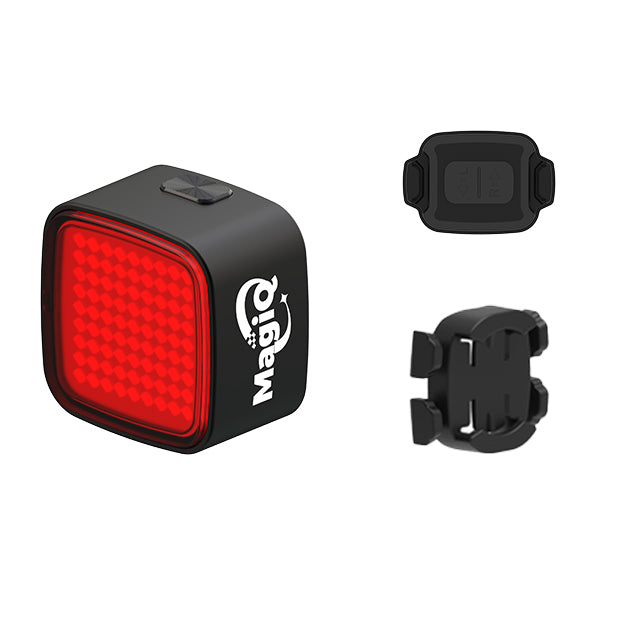 Black and red bike light with mounting bracket on a white background