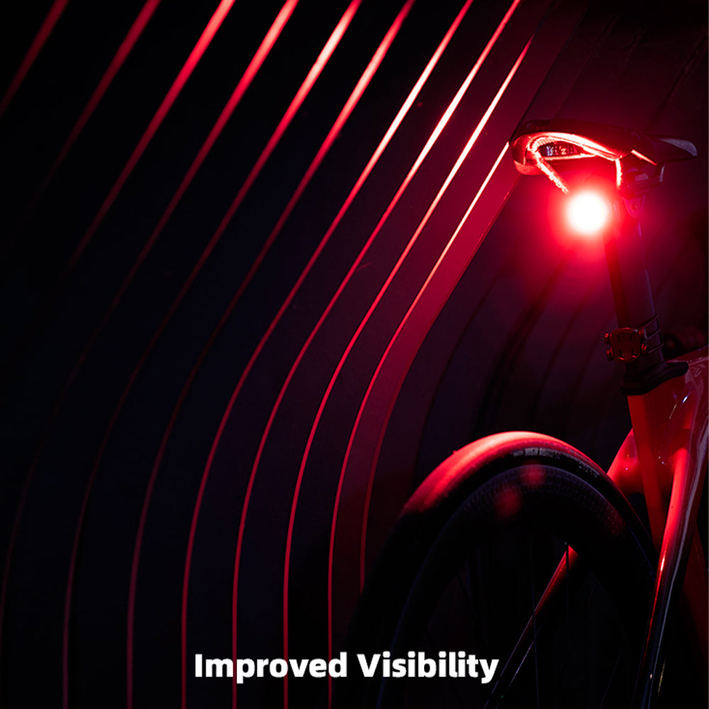Red light emitting device on a dark background with 'Improved Visibility' text.